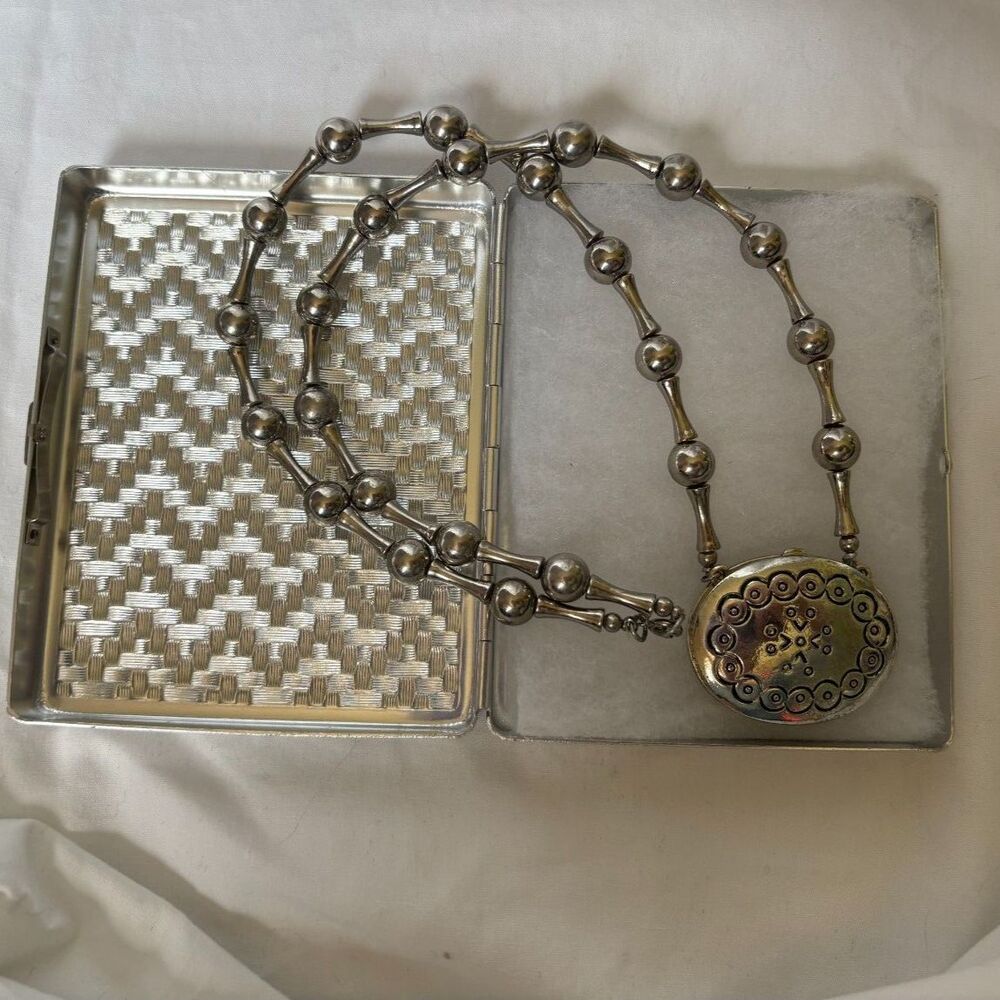 Estee Lauder Silver Necklace